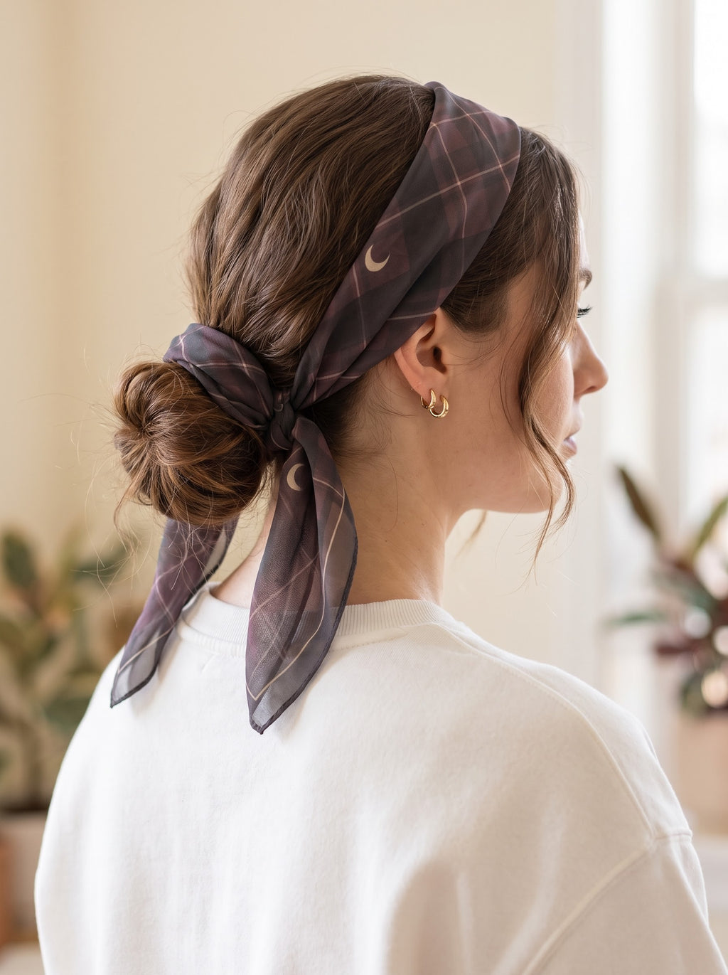 Plum Tartan Moons sheer chiffon scarf worn as a headband and tied around a bun