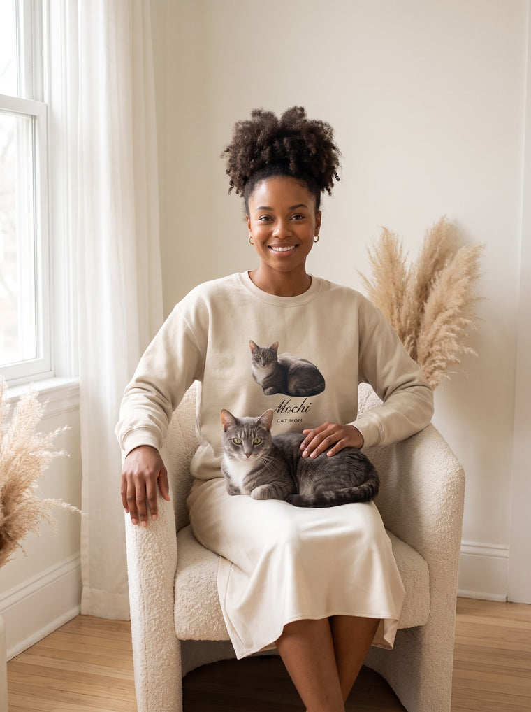 Woman with her cat on her lap, wearing a custom pet photo sweatshirt