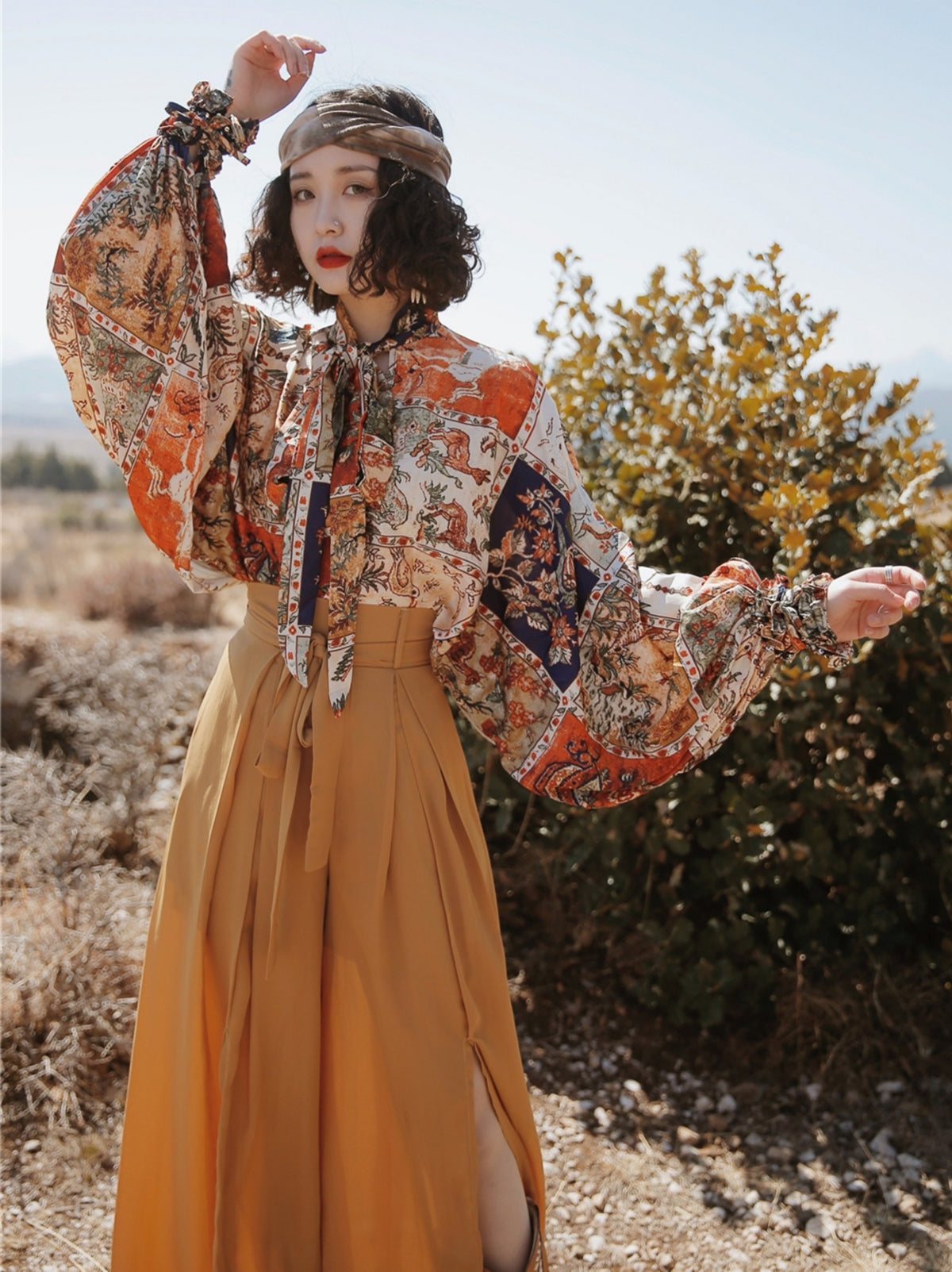 Autumn Muse floral blouse showing voluminous balloon sleeves