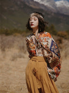 Autumn Muse floral blouse with ribbon bow neck, close-up