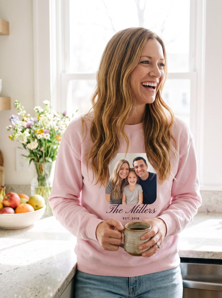 Mom wearing a custom family photo sweatshirt