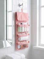 Hanging pink toiletry pouch with clear zip compartments, included with the Bag + toiletry pouch option
