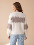 Back view of the Latte Days cream and taupe rib knit sweater with the taupe band across the upper back