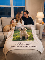 Couple sharing a large 60 x 80 inch custom pet photo blanket on the sofa with their puppy