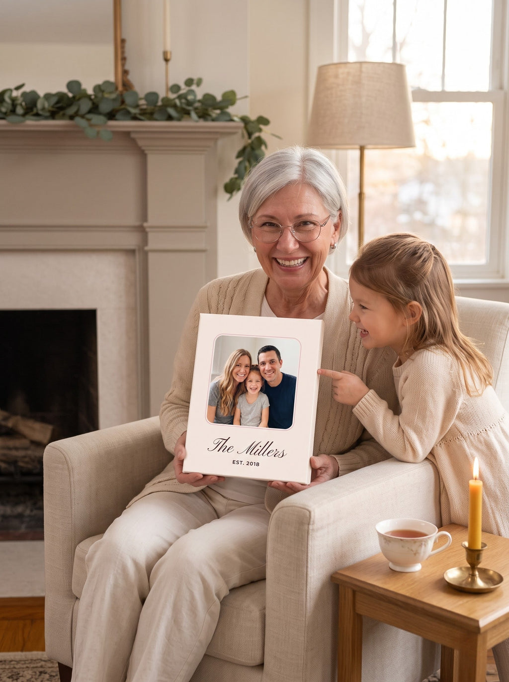 Grandma holding a custom family photo canvas with her granddaughter at the holidays