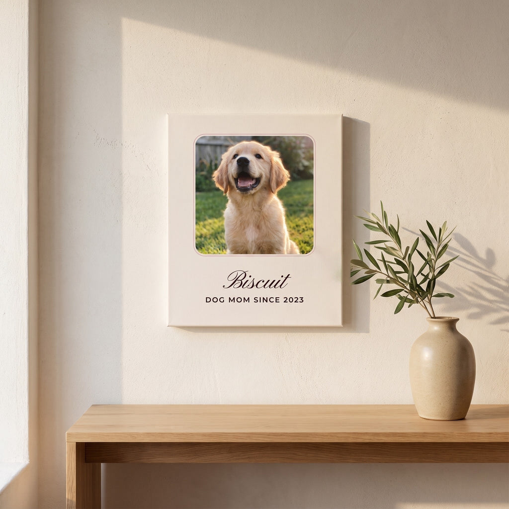 Custom golden retriever photo canvas hanging above an oak console