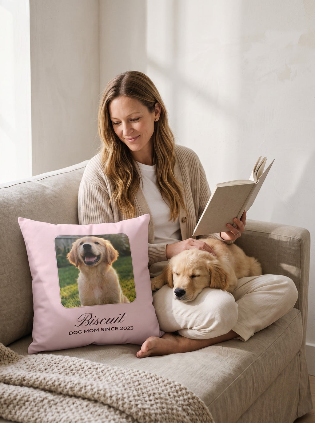 Woman reading on the sofa with her puppy and a custom dog photo pillow