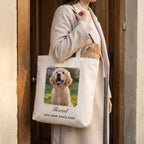 Woman carrying a custom golden retriever photo tote bag on her shoulder at the front door