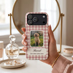 Rose gingham phone case with a puppy photo window at a vanity with a brass mirror