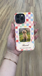 Candy checker full-wrap case with a puppy photo window, held in hand