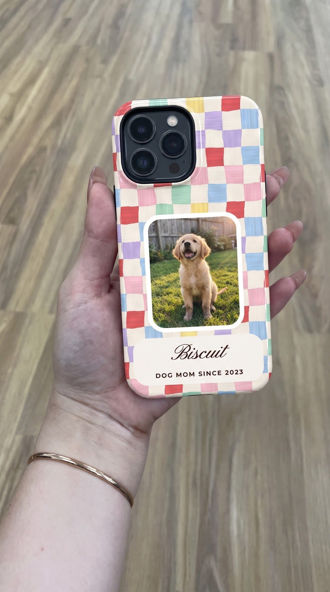 Candy checker full-wrap case with a puppy photo window, held in hand