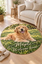 Round area rug printed with a dog photo and name on a light oak floor in a bright living room