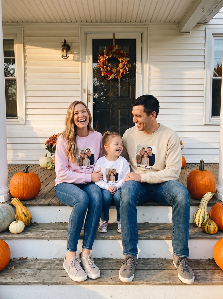 Family in matching custom photo sweatshirts