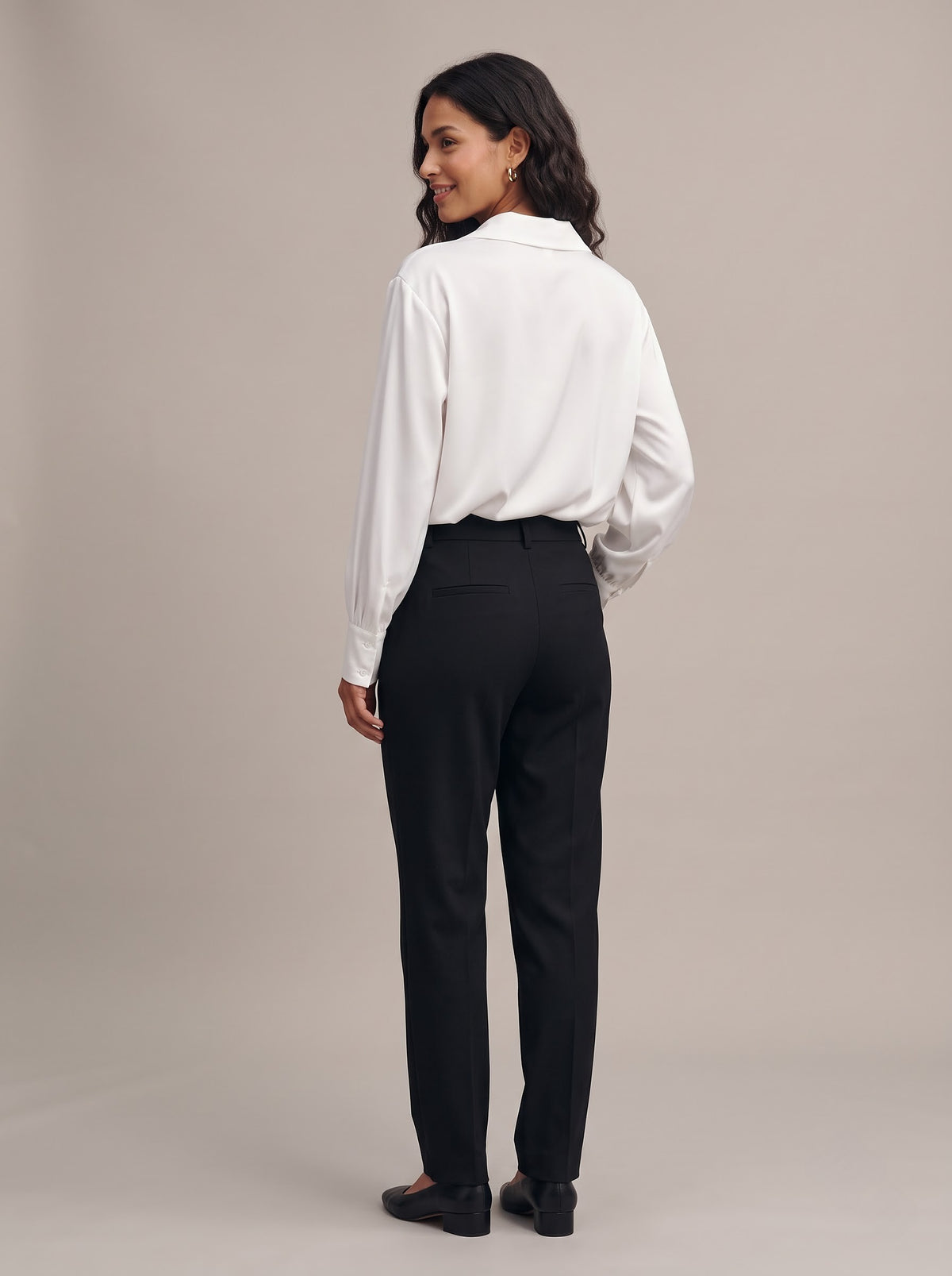 Back view of the white Quiet Luxe satin blouse with shirt collar