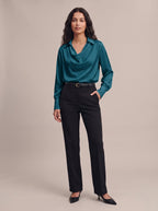 Quiet Luxe cowl neck satin blouse in peacock blue, studio view